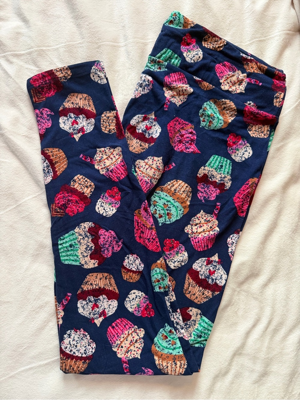 LuLaRoe Navy Leggings with Bright Cupcake Print